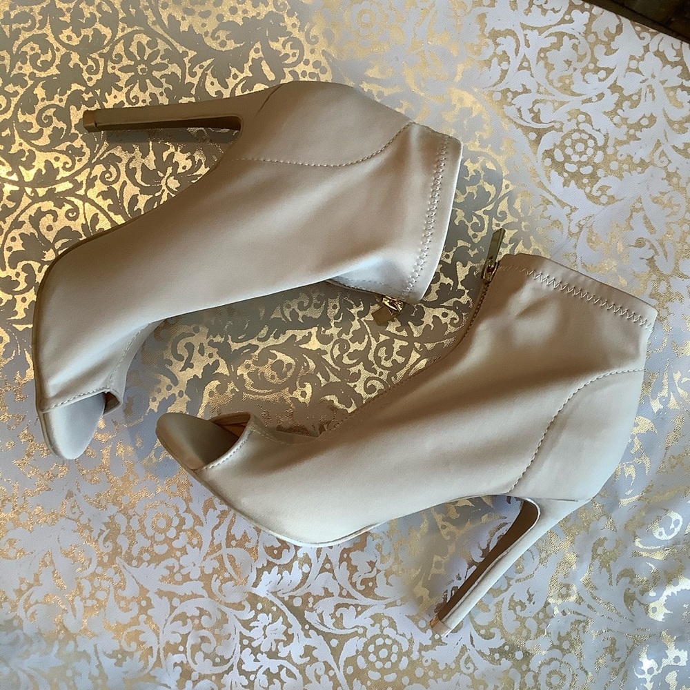 Nude peep toe stretch booties